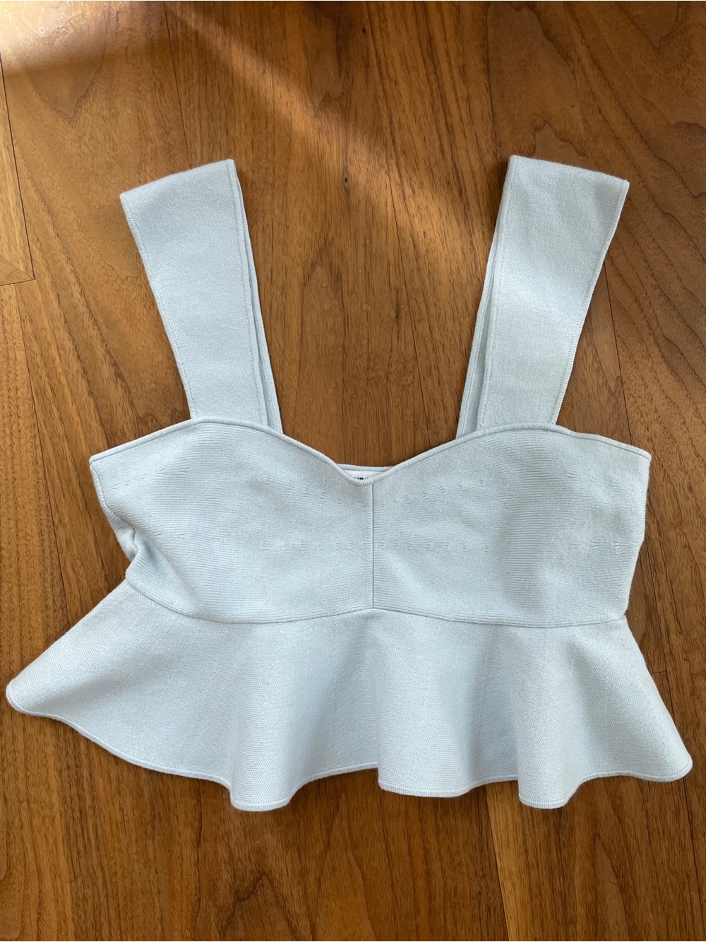 Peplum knit tank top